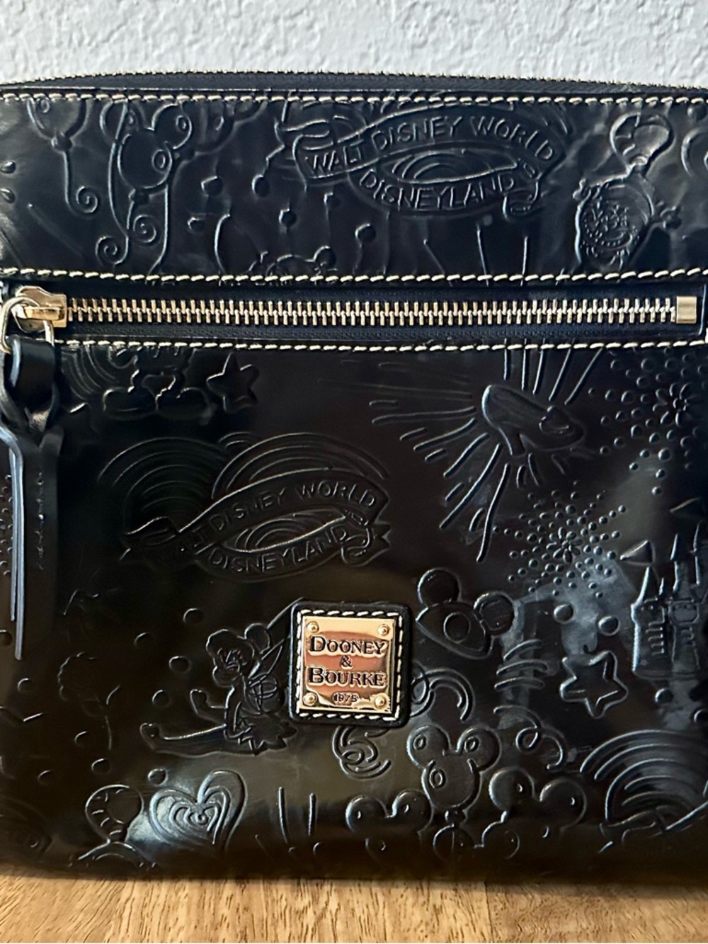Dooney & Bourke Black Embossed Disney Crossbody Bag with Gold Hardware